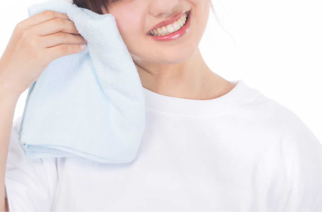 汗を掻く女性
